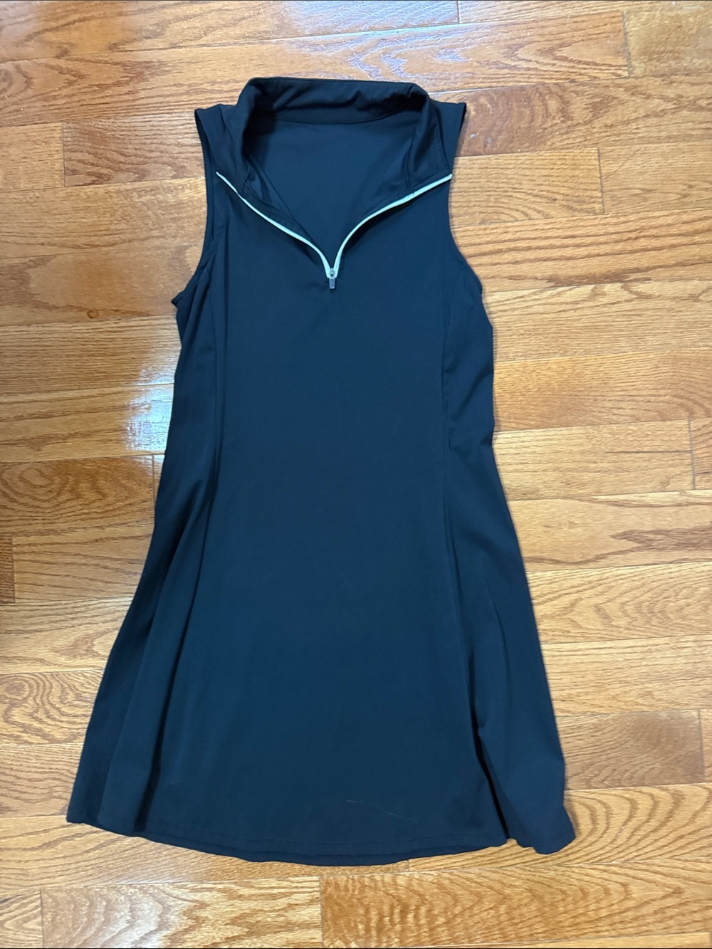 Sleeveless Black Mini Dress with Zip Neck